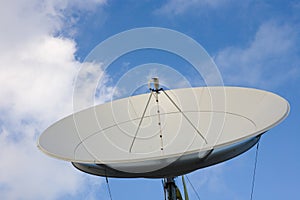 Satellite dish on blue sky