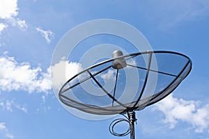 Satellite dish and cloudy as blue sky background