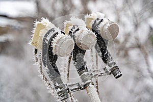 Satellite dish converter device in witer. Parabolic satellite antenna dish LNB converter detail covered by hoarfrost