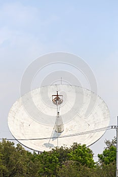 Satellite dish on the ground.