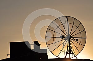 Satellite dish on a roof photo
