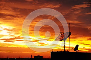 Satellite dish in the sunset