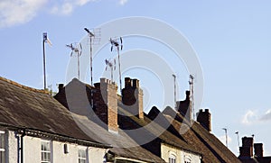 A satellite dish and TV arial