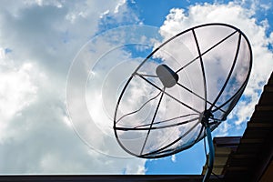 Satellite dish for TV and blue sky background