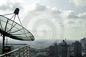 Satellite dishes On the balcony of the tall building In Bangkok at Thailand