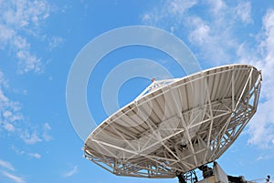 Satellite dishes on buildings.