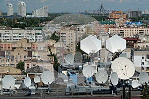 Satellite dishes on house roof