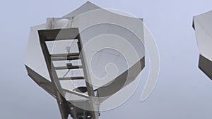Satellite dishes receive and transmit signal