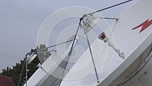 Satellite dishes receive and transmit signal