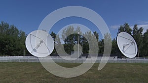 Satellite dishes receive and transmit signal