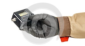 Satellite finder in electrician hand in black protective glove isolated on white background