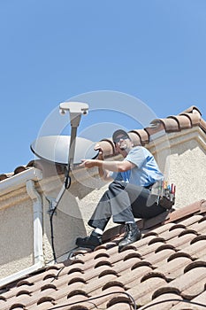 Satellite Installer on Roof