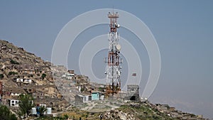 Satellite signal poles near a city