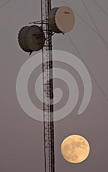 Satellite Tower and Full Moon