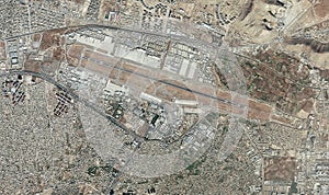 Satellite view of Kabul airport, Hamid Karzai International Airport, houses, streets and buildings in the neighboring area