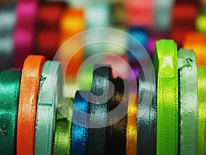 Satin ribbon a substrate background of rainbow colors