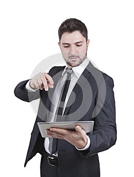 Satisfied businessman holding tablet