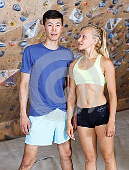 Satisfied fit couple after climbing workout