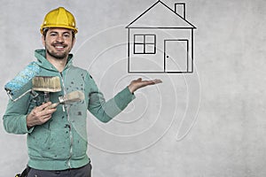 Satisfied painter shows home plan above the hand
