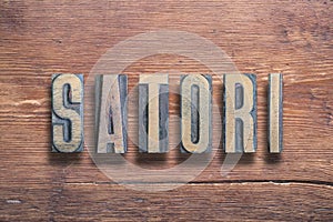 Satori letters wood