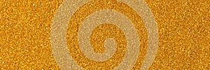 Saturated sparkle gold glitter background. photo