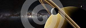 Saturn moon Enceladus in front of planet Saturn, rings, other moons and the Milky Way galaxy banner