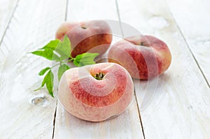 Saturn peaches or UFO, donut, flat peaches