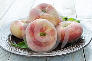 Saturn peaches or UFO, donut, flat peaches