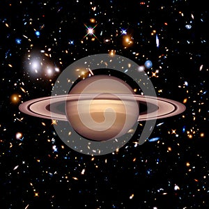 Saturn. Planet against galaxies and stars. The elements of this image furnished by NASA