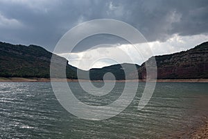 Sau reservoir in Barcelona, it is a cloudy day and it is full of water
