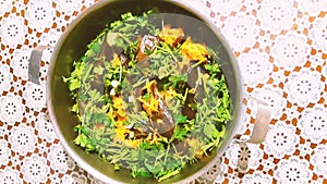 A saucepan with herbs and vegetables. Eggplant and carrots, cooking. Healthy foods, diet. Vegetarian menu. Color video modern
