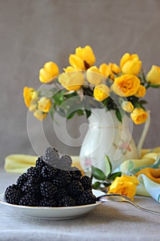 Saucer with blackberries