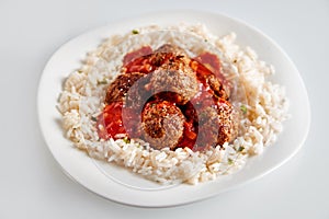 Saucy Homemade Meatballs on a Bed of White Rice