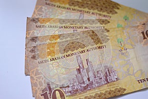 Saudi Arabia 10 SAR ten Saudi riyals cash money banknote with the photo of king Abdullah Bin AbdulAziz Al Saud, Murabba palace and