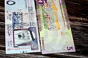 Saudi Arabia 5 SAR five Saudi riyals cash money banknote with the photo of king Abdullah bin AbdulAziz Al Saud and Flowers