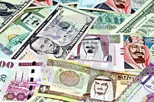 Saudi Arabia riyals money banknotes with American dollars banknotes money