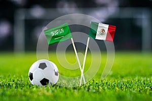 Saudi Arabia vs. Mexico, Lusail, Football match wallpaper, Handmade national flags and soccer ball on green grass. Football
