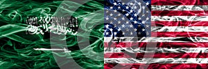 Saudi Arabia vs United States of America smoke flags placed side by side. Thick colored silky smoke flags of Saudi Arabia and Unit