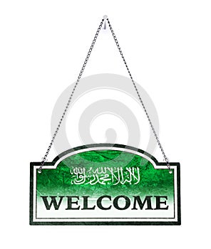 Saudi Arabia welcomes you! Old metal sign isolated