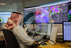 saudi man in Weather Analysis and Forecast Center, Meteorology center photo