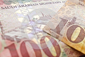 Saudi riyal banknotes money background.