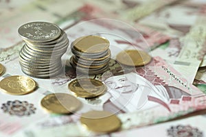 Saudi Riyal notes with Golden pounds photo