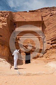 Saudian in MadaÃÂ®n Saleh archeological site, Saudi Arabia photo