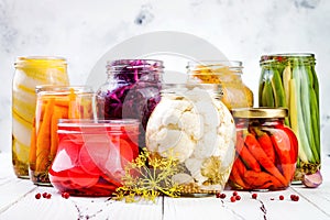 Sauerkraut and marinated pickles variety preserving jars. Homemade red cabbage beetroot, turmeric kraut,