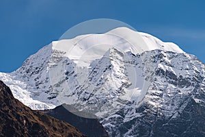 Saula mountain peak view from Lho village, Manaslu circuit trekking route in Himalaya mountains range, Nepal