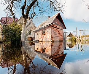 Sauna bath building In Water During Spring Flood floodwaters during natural disaster. Water deluge During A Spring Flood