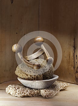 Sauna, hammam or Turkish bath wooden background with genuine loofah