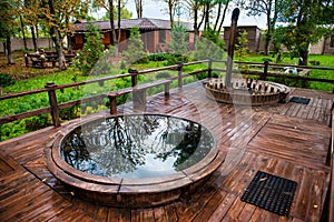 Sauna pool and jacuzzi with rest recreation area outdoor in luxury forest villa.