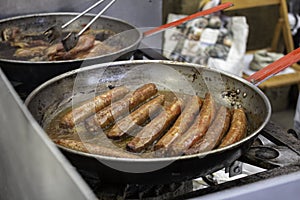 Sausage and bacon frying