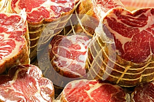 sausage called Culatello with cellophane for sale in the Italian